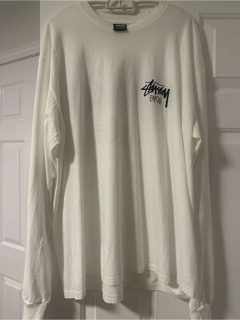 Stussy White Long Sleeve Tee with Black Script Logo